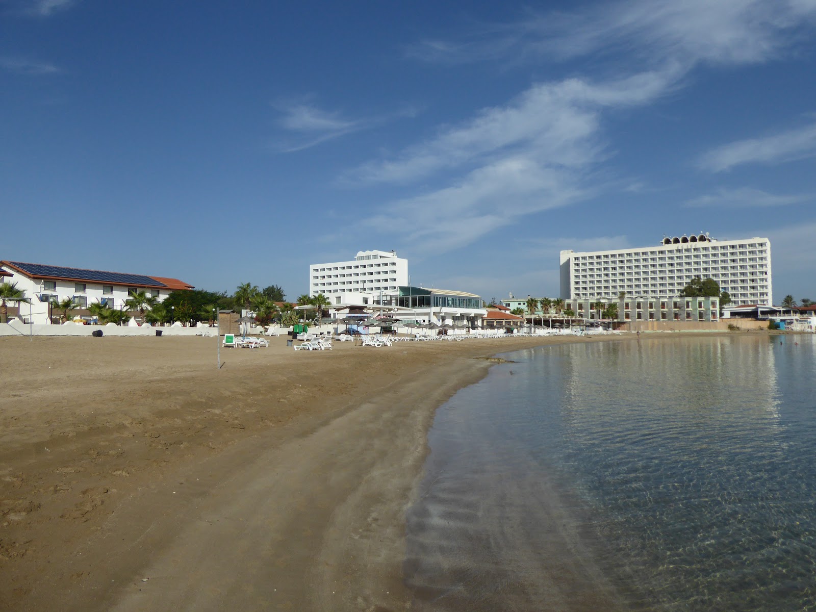 Photo of Salamis beach with blue pure water surface