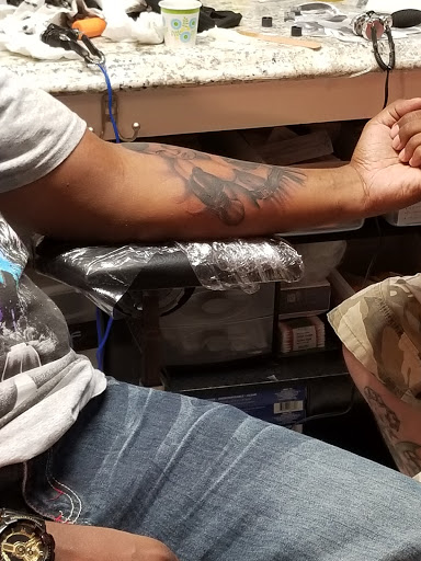 Explore pictures for tattoo ideas, creative tattoo ideas in Pearland, available at Black List Tattoo & Piercing Co.