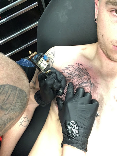 Tattoo Shop «Metropolis Tattoo and Fine Art», reviews and photos, 721 S Elm St Suite 109, Denton, TX 76201, USA