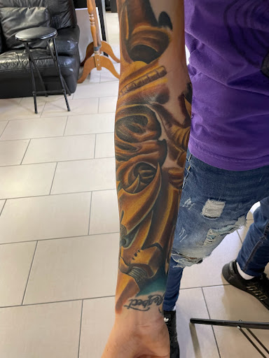 Explore cool finger tattoo ideas, creative tattoo ideas in Sarasota, available at SEVEN SINS Tattoo Studio