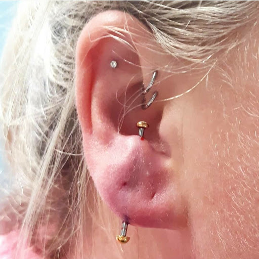 Explore bike tattoo ideas, creative tattoo ideas in North Charleston, available at Exotic Impressions Body Piercing