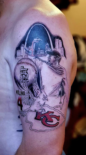 Explore kiss lip tattoo ideas, creative tattoo ideas in Ozark, available at Olympus Heights