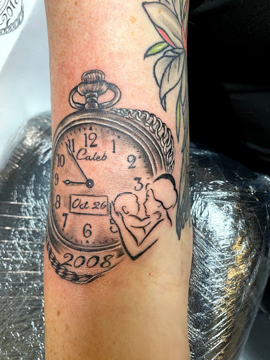 Explore baby foot print tattoo ideas, creative tattoo ideas in Warner Robins, available at Untold Pain Tattoo Studio