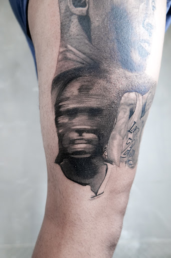 Explore back of leg tattoo ideas, creative tattoo ideas in Los Angeles, available at Ethos Art Haus Tattoo