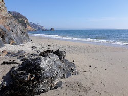 Foto von Duporth beach mit sehr sauber Sauberkeitsgrad
