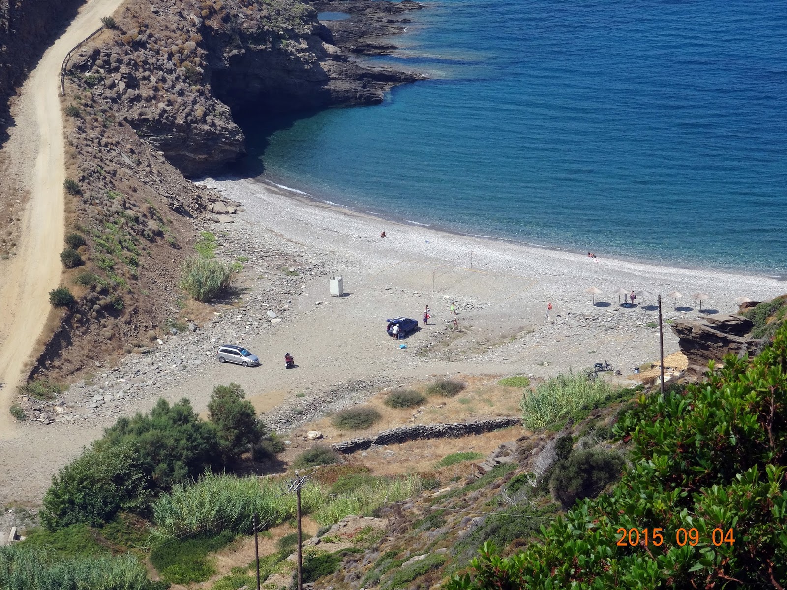 Photo of Aris beach with gray pebble surface