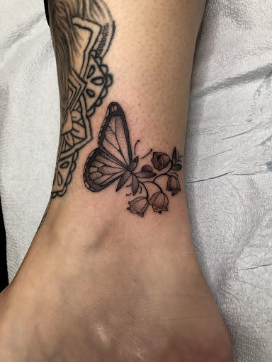 Explore back tattoo for women ideas, creative tattoo ideas in Menomonie, available at Kindhand Tattoo