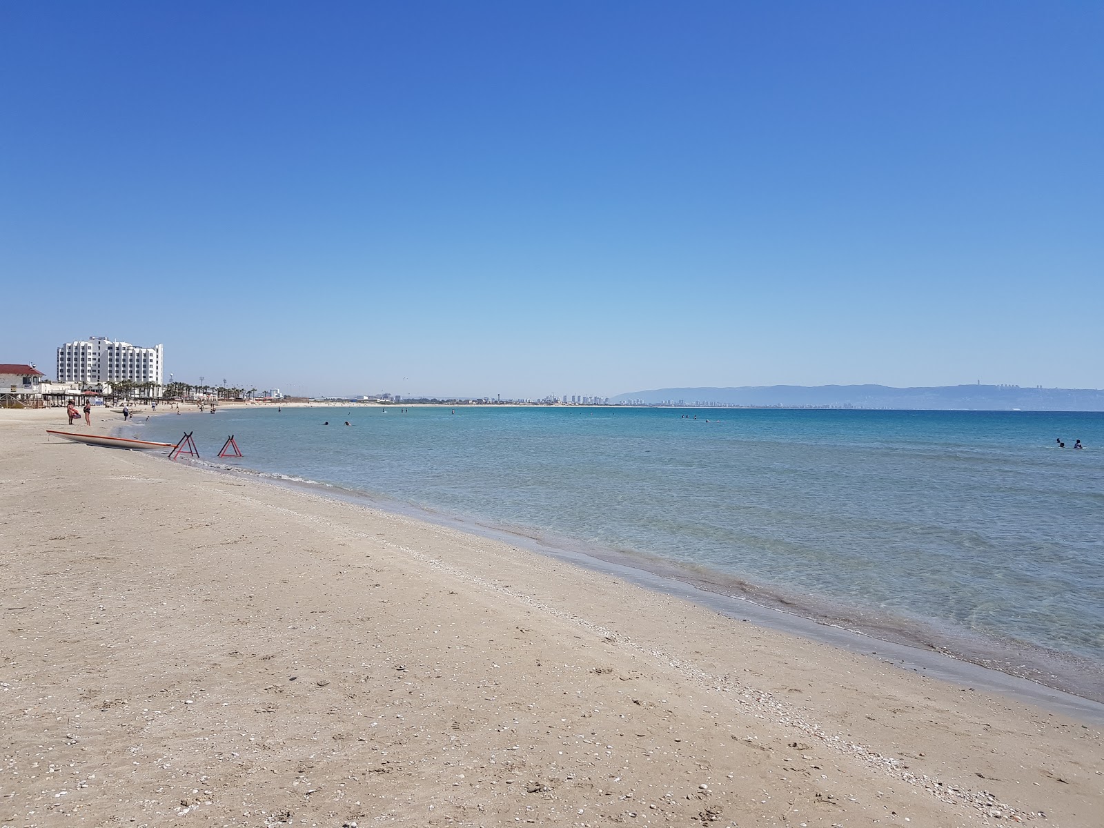 Argaman beach的照片 带有米色沙子表面