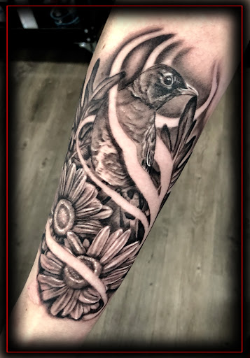 Explore deceased dog tattoo ideas, creative tattoo ideas in Omaha, available at Eternal Tattoo & Body Piercing - Omaha