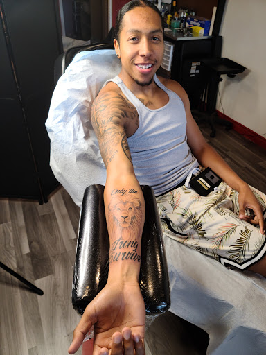 Explore tattoos behind ear ideas, creative tattoo ideas in Clarkston, available at Rogue Tattoo