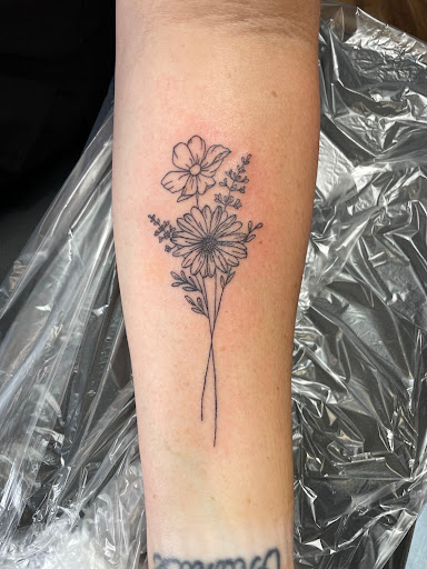 Explore snake tattoo ideas for guys, creative tattoo ideas in Granville, available at Moody Manor