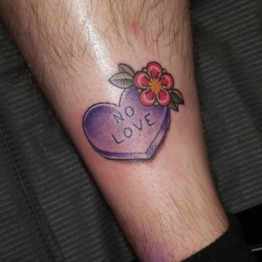 Explore rare breed tattoo ideas, creative tattoo ideas in Spartanburg, available at The Gallery Tattoo Shop Spartanburg