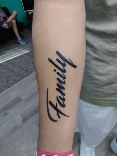 Explore line tattoo ideas for females, creative tattoo ideas in Lufkin, available at Blue Lotus Tattoo & Piercing