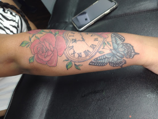 Explore tattoo ideas for knuckles, creative tattoo ideas in Kewanee, available at Splat Ink tattoos and piercings