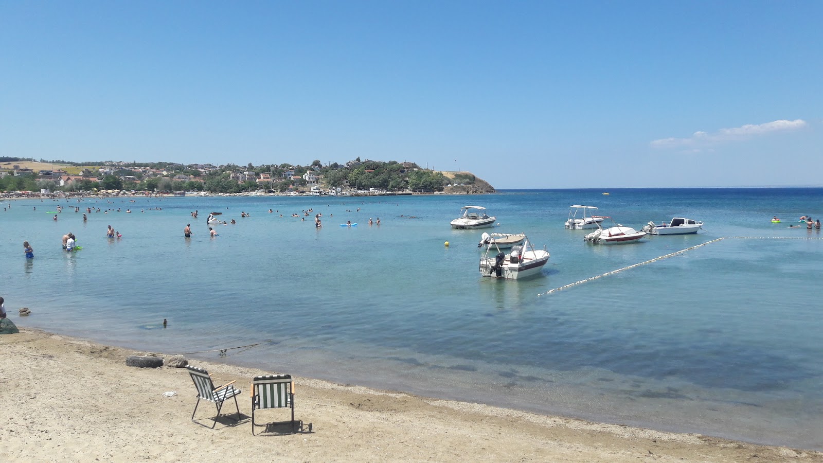 Foto van Guneyli beach met beige zand oppervlakte