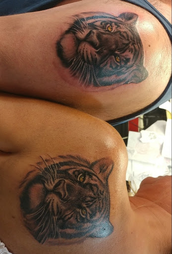Explore matching father daughter tattoos ideas, creative tattoo ideas in Pensacola, available at Pensacola Tattoo Studio