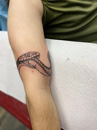 Explore tattoo name cover up ideas on wrist, creative tattoo ideas in El Paso, available at American Tattoo Society of Ft Bliss