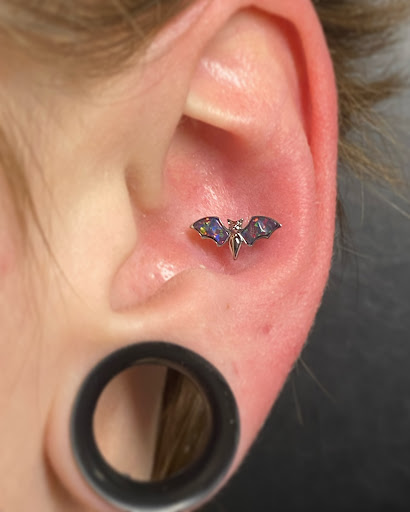 Explore giving tree tattoo ideas, creative tattoo ideas in Oswego, available at Bodified