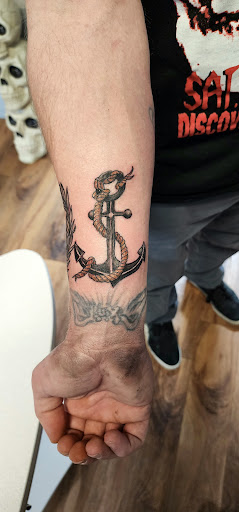 Explore hellscape sleeve tattoo ideas, creative tattoo ideas in Lafayette, available at DragonsBane Tattoo & Body Piercing