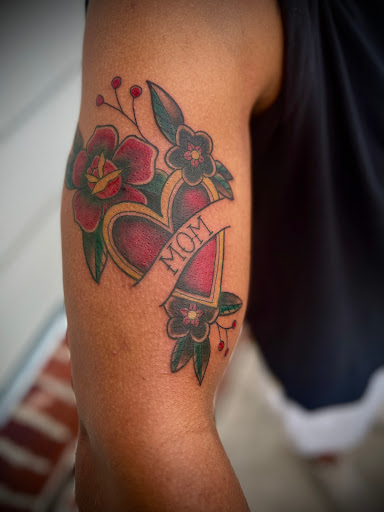 Explore bear tattoo ideas for men, creative tattoo ideas in Wallace, available at Artistic Abyss Tattoo Collective