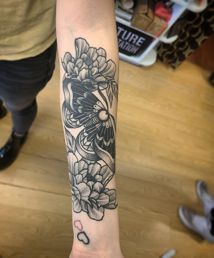 Explore gothic hand tattoo ideas, creative tattoo ideas in Lewisburg, available at Rose and Dagger Tattoo