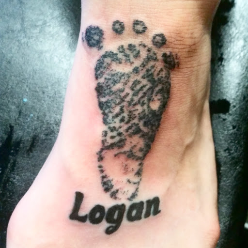 Explore ghost tattoo ideas, creative tattoo ideas in Erie, available at EliKingInk