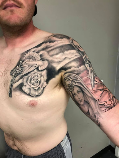 Tattoo Shop «Lucky DeVille Tattoo Co.», reviews and photos, 2333 Niagara Falls Blvd, Amherst, NY 14228, USA