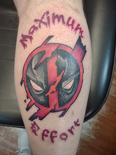 Explore men's back of neck tattoo ideas, creative tattoo ideas in Lafayette, available at Crown & Anchor Tattoos