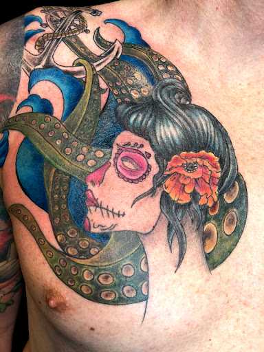 Explore trigun tattoo ideas, creative tattoo ideas in Greenfield, available at Tattoos In Time Studio