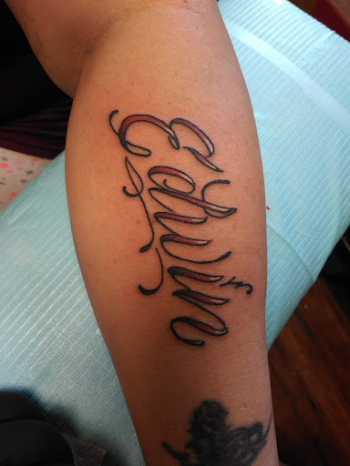 Find wrist bracelet tattoo ideas for your next unique tattoo in Altoona at Custom Skin Art