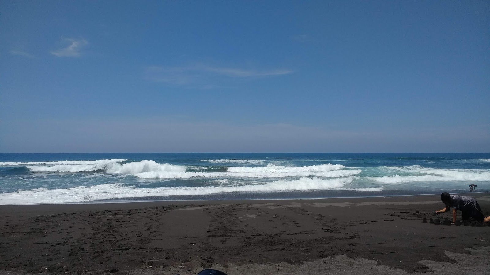 Photo de Playa de Cuyutlan avec rivage droit, long