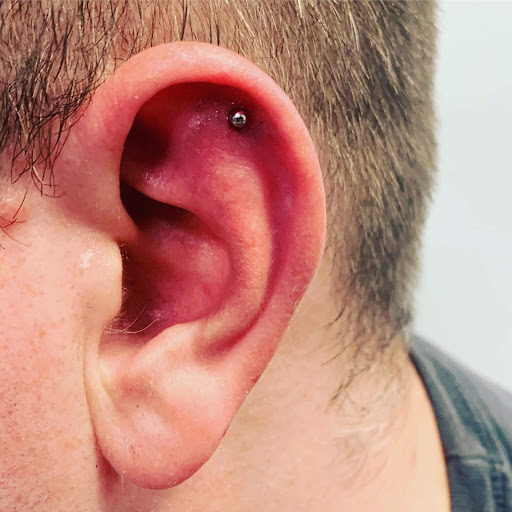 Find astrological tattoo ideas for your next unique tattoo in Round Rock at Piercings by Toni