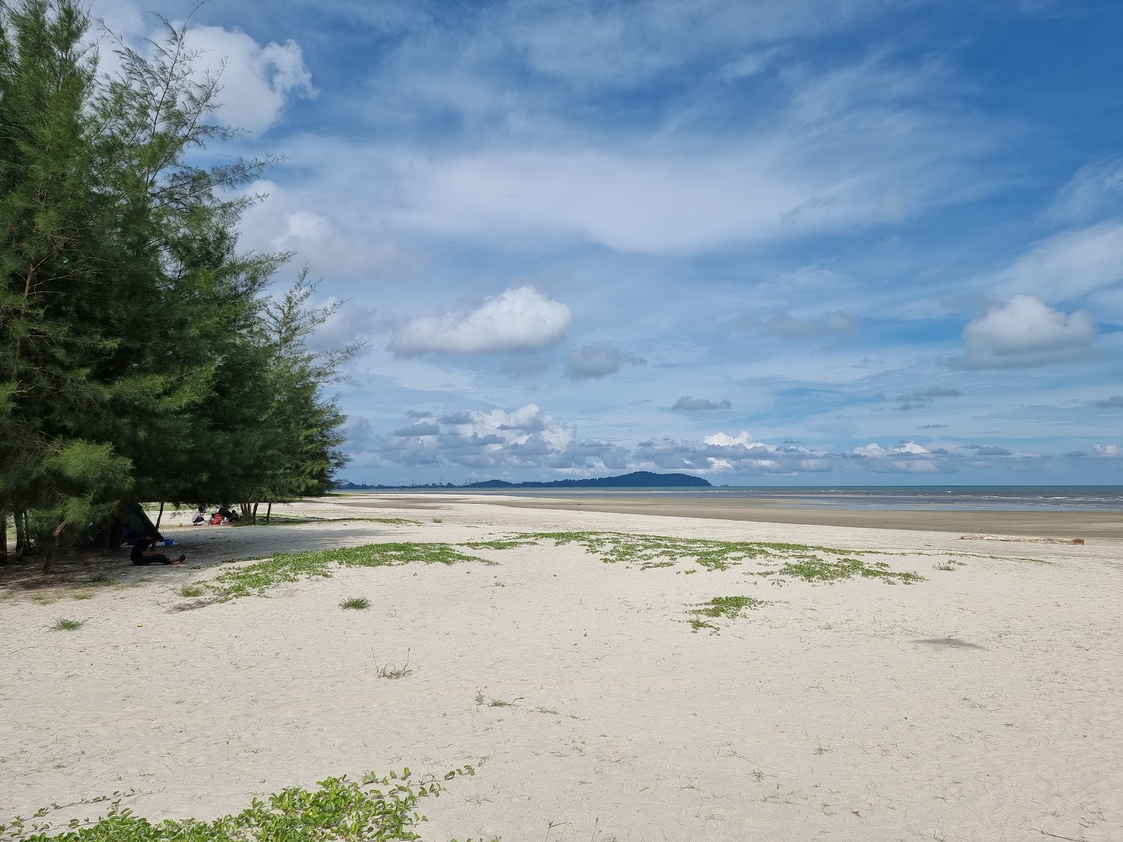 Foto av Balok Beach med grå sand yta
