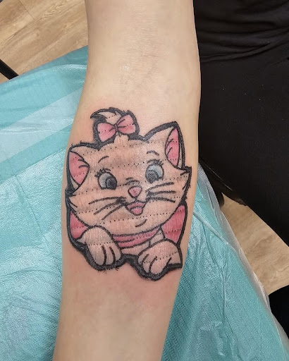 Explore tattoo ideas eays, creative tattoo ideas in New Hampton, available at Crescent Moon Tattoo