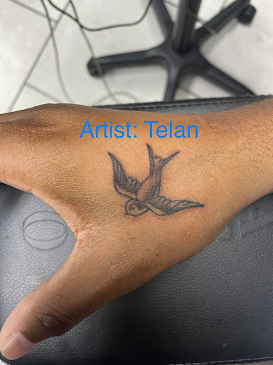 Explore knife tattoo ideas, creative tattoo ideas in Foley, available at Symbolic Ink Tattoo Studio