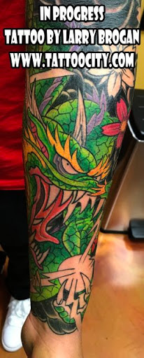 Explore arm flower tattoo ideas, creative tattoo ideas in Lockport, available at Tattoo City by Larry Brogan