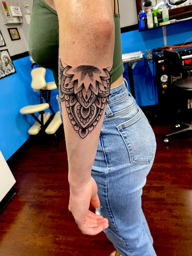 Explore to infinity and beyond tattoo ideas, creative tattoo ideas in Modesto, available at Inkwell Tattoo