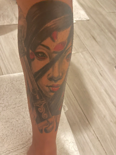 Explore fishnet tattoo ideas, creative tattoo ideas in Katy, available at Family Tattoo Studio