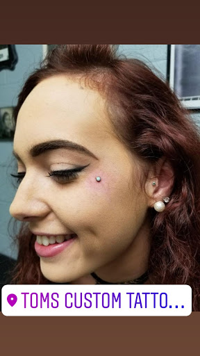Explore rolling stones tattoo ideas, creative tattoo ideas in Elko, available at Tom Custom Tattoos and Body Piercing Studio