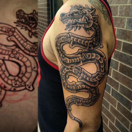 Tattoo Shop «Proton Tattoo», reviews and photos, 120 S 4th St, DeKalb, IL 60115, USA