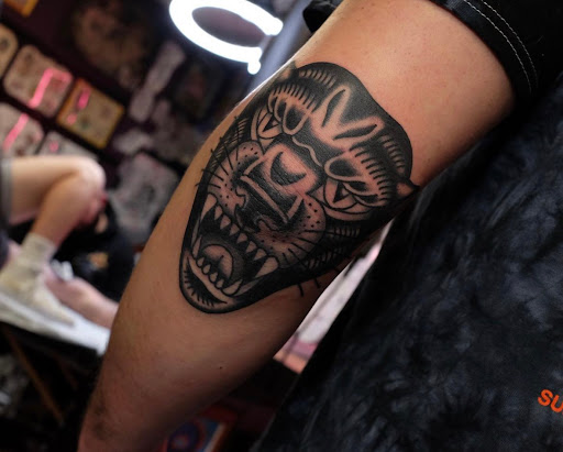 Explore polka trash tattoo ideas, creative tattoo ideas in Georgetown, available at Iron Rite Tattoo South