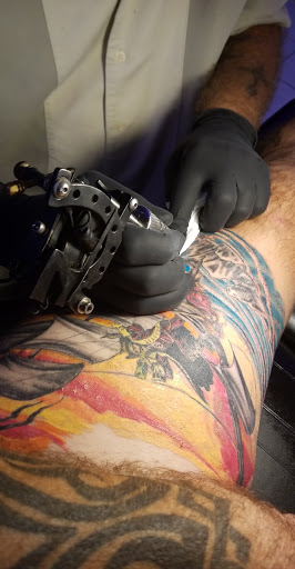 Explore crucifix tattoo ideas, creative tattoo ideas in Foley, available at Next Level Tattoo