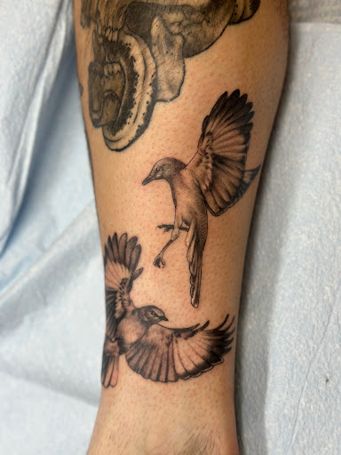 Explore religious cross tattoo ideas, creative tattoo ideas in West Babylon, available at Beacon Tattoo & Piercings