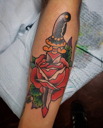 Explore knee cap tattoo ideas for men, creative tattoo ideas in Libertyville, available at Lucky Seven Tattoo