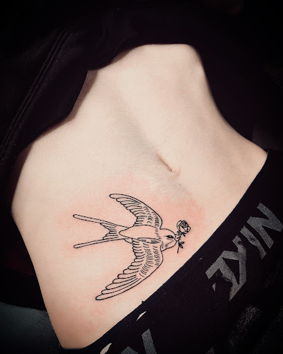 Explore tattoo ideas for a name, creative tattoo ideas in North Tonawanda, available at Dark Side Ink Tattoo Studio