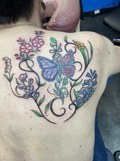 Explore bike tattoo ideas, creative tattoo ideas in Redding, available at DEADLIFT TATTOO