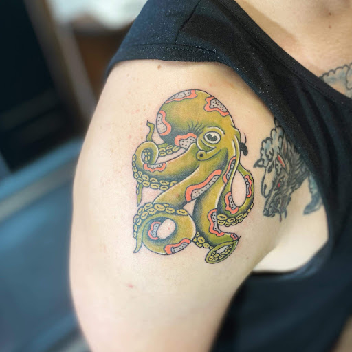 Explore shoulder blade tattoo ideas, creative tattoo ideas in Ocala, available at Beauty in a Canvas Tattoo and Art Gallery