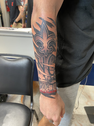 Explore half sleeve ocean tattoo ideas, creative tattoo ideas in Kenner, available at Electric Expressions