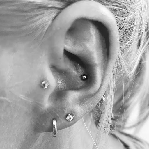 Explore back cover up tattoo ideas, creative tattoo ideas in Palm Harbor, available at Angry Owl Tattoo and Piercing