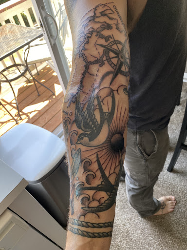 Explore male arm tattoo ideas, creative tattoo ideas in Astoria, available at Signal Tattoo